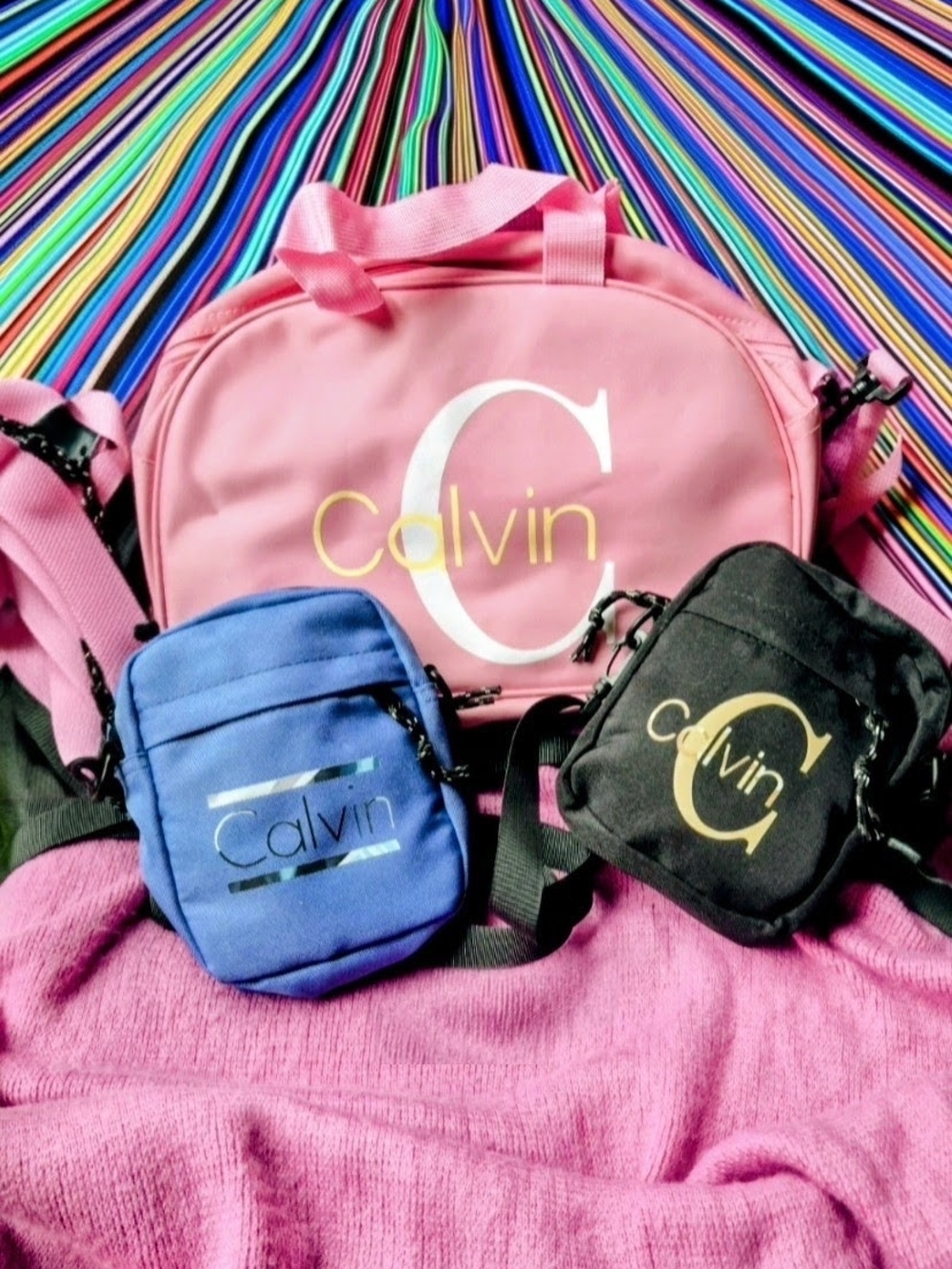 Calvin Klein Pink Duffle with Blue and Black Crossbody Pouches